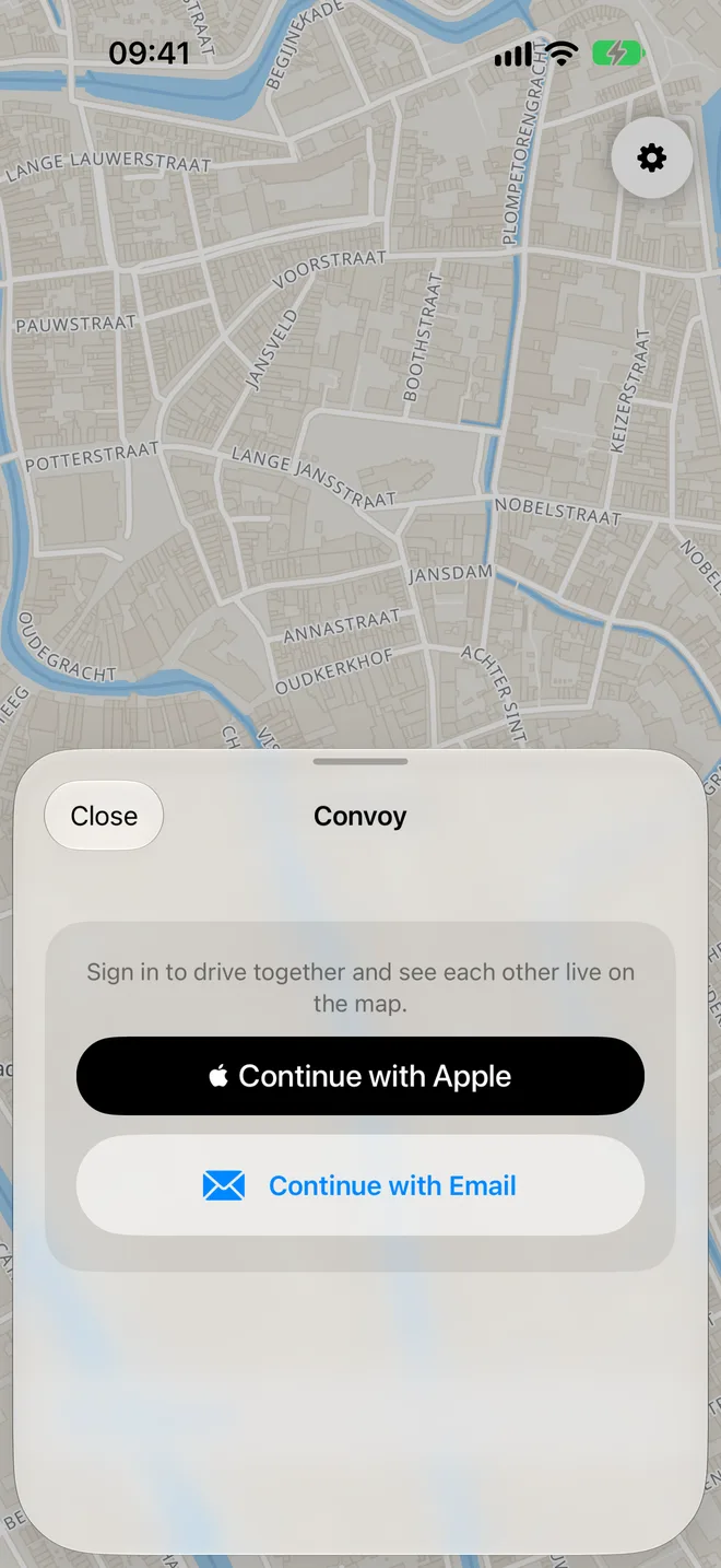 Het konvooischerm dat vraagt om in te loggen met Apple of met e-mail.